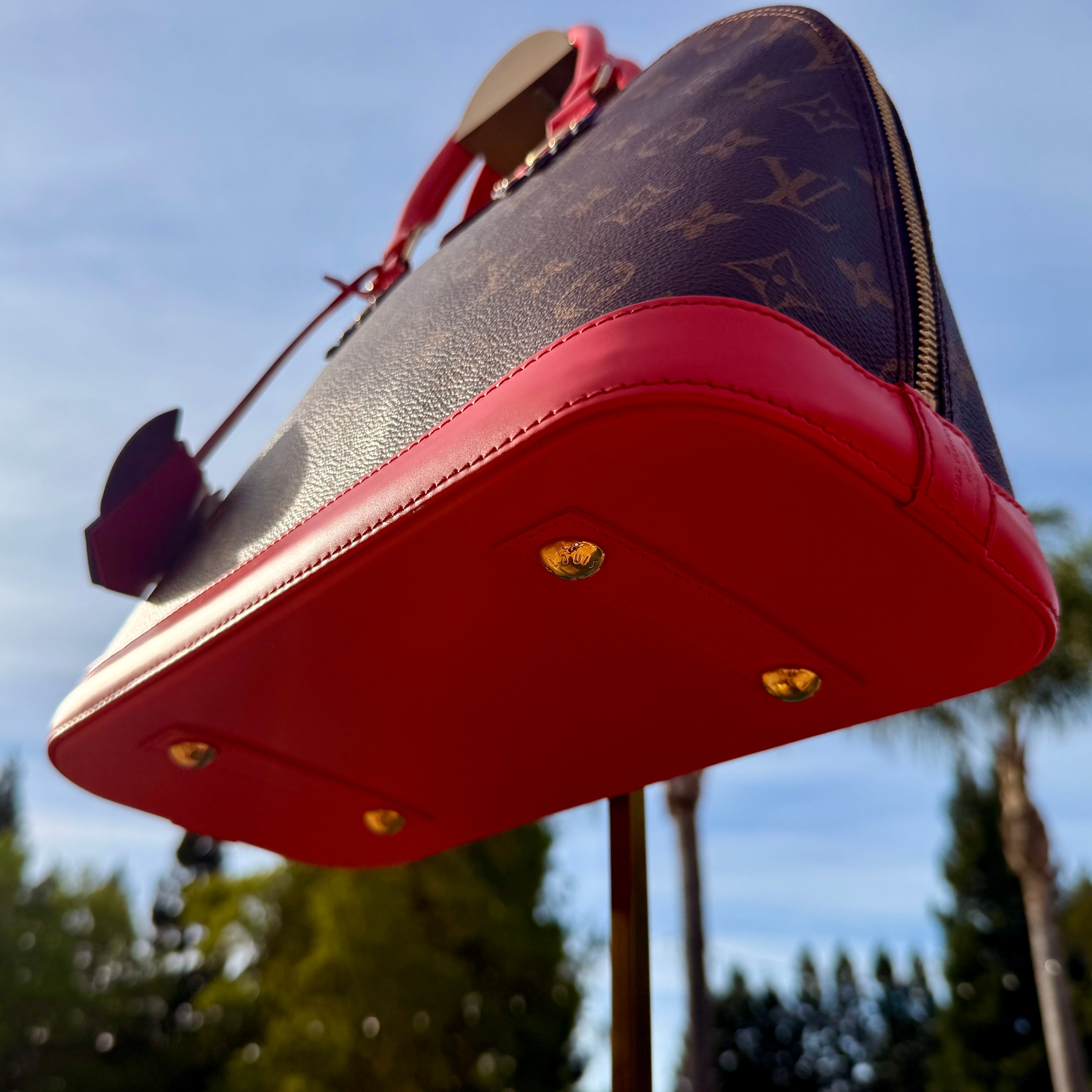 Louis Vuitton	Limited Edition Monogram Totem Alma PM Flamingo