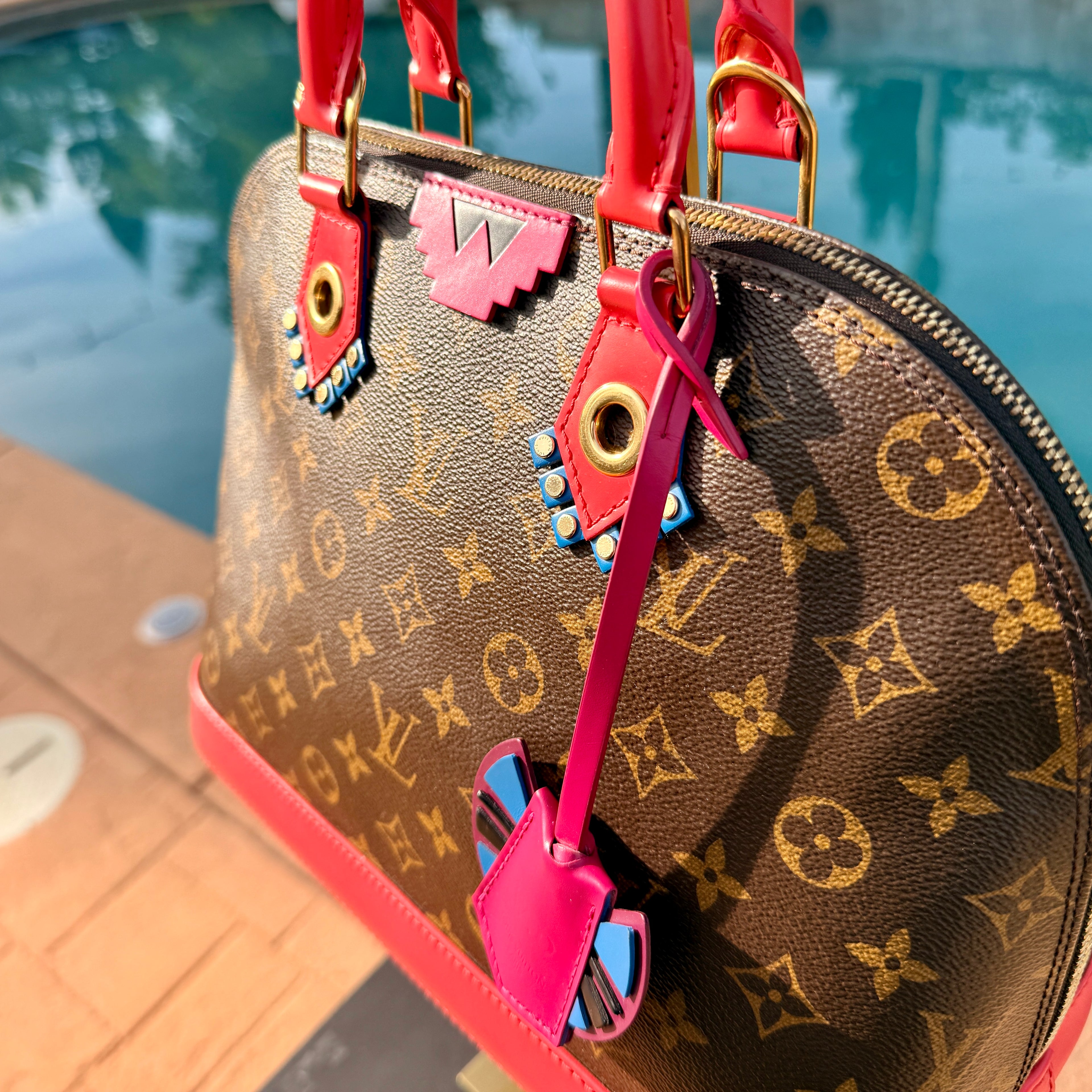 Louis Vuitton	Limited Edition Monogram Totem Alma PM Flamingo